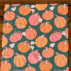 Pumpkins on Green Kitchen Towel