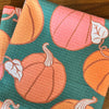 Pumpkins on Green Kitchen Towel