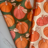 Pumpkins on Green Kitchen Towel